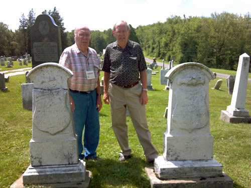 Wendell Lauth and Lee Wise standing by John Christlieb's headstone in Melsheimer Cemetery, Pike Township, Stark County, Ohio